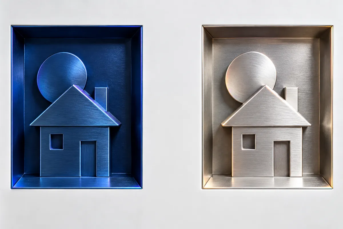 Matching metal house reliefs in separate blue and silver recesses with a wide gap between them.